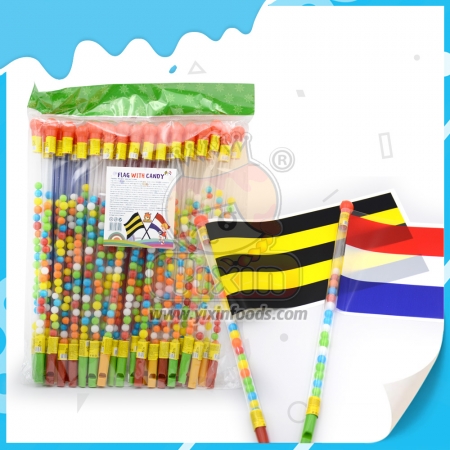 Caramelo de juguete con forma de bandera y silbato