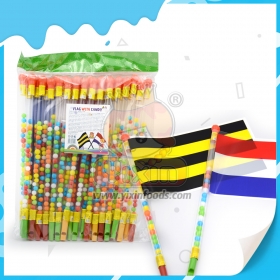 Caramelo de juguete con forma de bandera y silbato