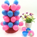 Piruleta de globo de colores con forma de martillo y piruleta pequeña 
