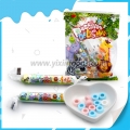 Bolsa giratoria que contiene caramelos de silbato de frutas multicolor 
