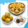 8 bolas redondas de chocolate en caja con forma de corazón 