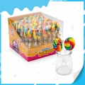 Caramelo de piruleta arcoíris de forma redonda de colores 