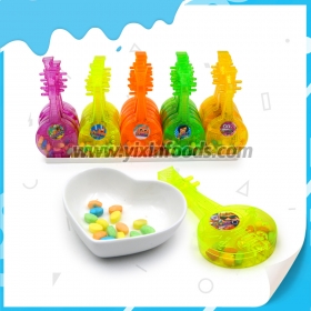 Juguetes de guitarra con caramelos