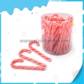 Caramelo de caña dulce de fruta de color rosa y blanco 